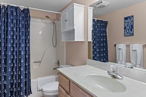 Combined shower/tub, towels, soap, shampoo