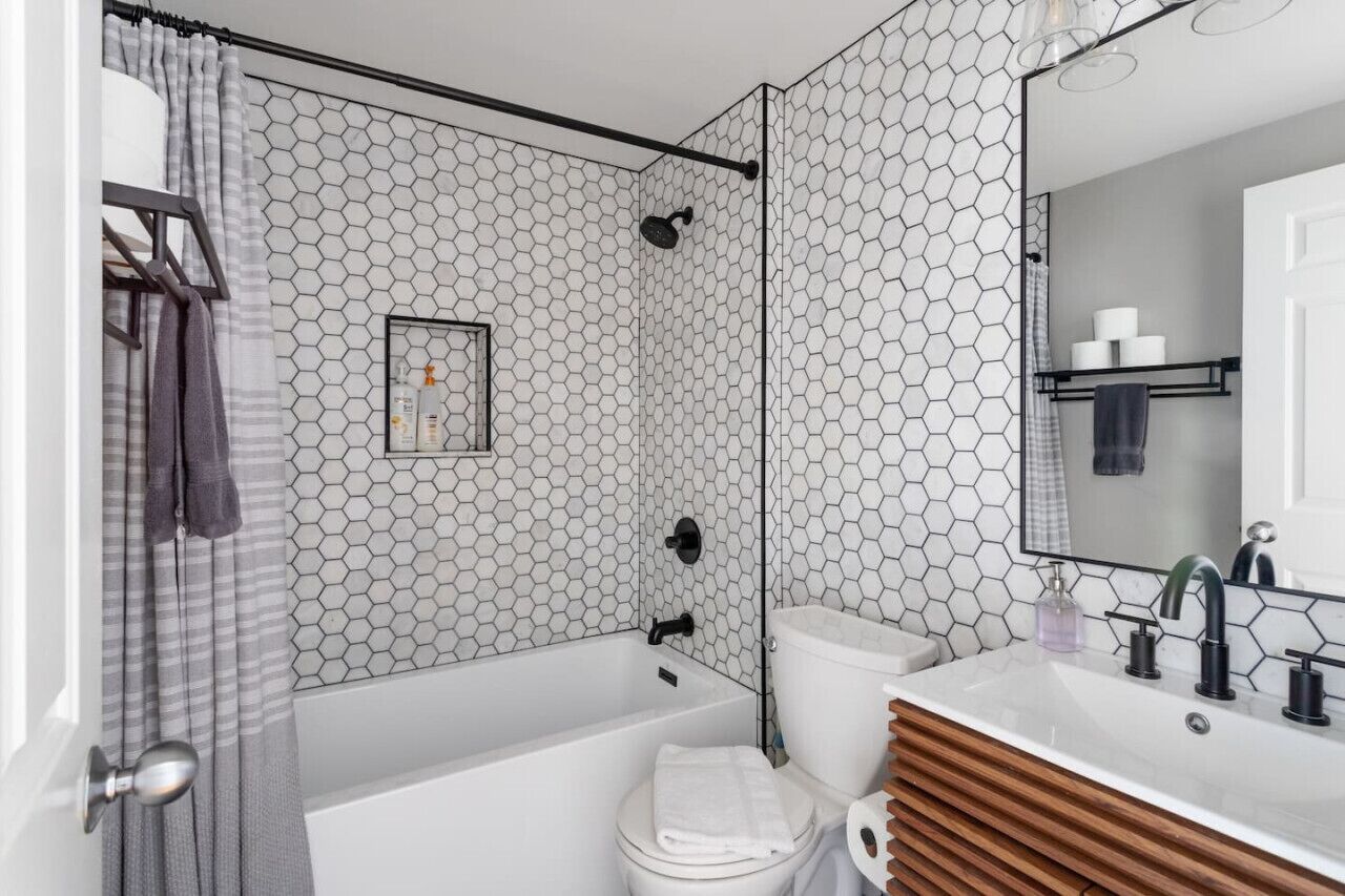 Combined shower/tub, hair dryer