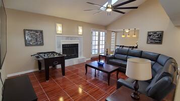 Smart TV, fireplace, DVD player, foosball