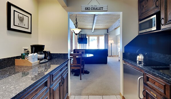 Fridge, microwave, stovetop, coffee/tea maker