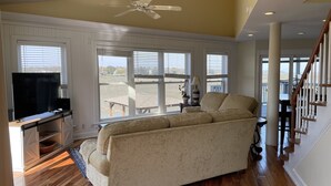 Flat-screen TV, DVD player, books, stereo - Folly Beach Riverfront Apt with dock, private boat ramp kayaks and bikes (Folly Beach)