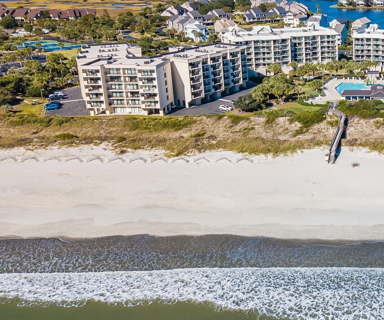 Oceanfront condo on the 5th floor with many amenities located within gated Pawleys Island community.