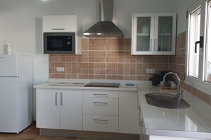 Fridge, microwave, coffee/tea maker, toaster