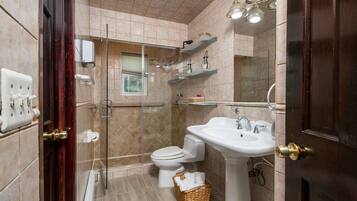 Bathtub, jetted bath, hair dryer, towels