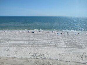 On the beach, sun-loungers