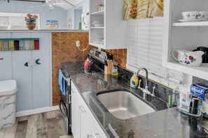 Fridge, microwave, oven, stovetop - Historic Beach Cottage steps from beach. Pet friendly! (Clearwater)
