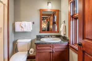 Bathtub, hair dryer, towels