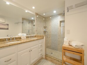 Combined shower/bathtub, hair dryer, bidet, towels - Surfside Condos 202 Beachfront Oasis with Heated Pool (Clearwater Beach)