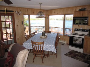 Inside dining for 8 overlooking Stevens Lake, additional deck dining space