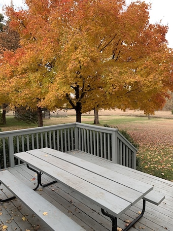 Outdoor dining. "Your Country Home Away from Home"