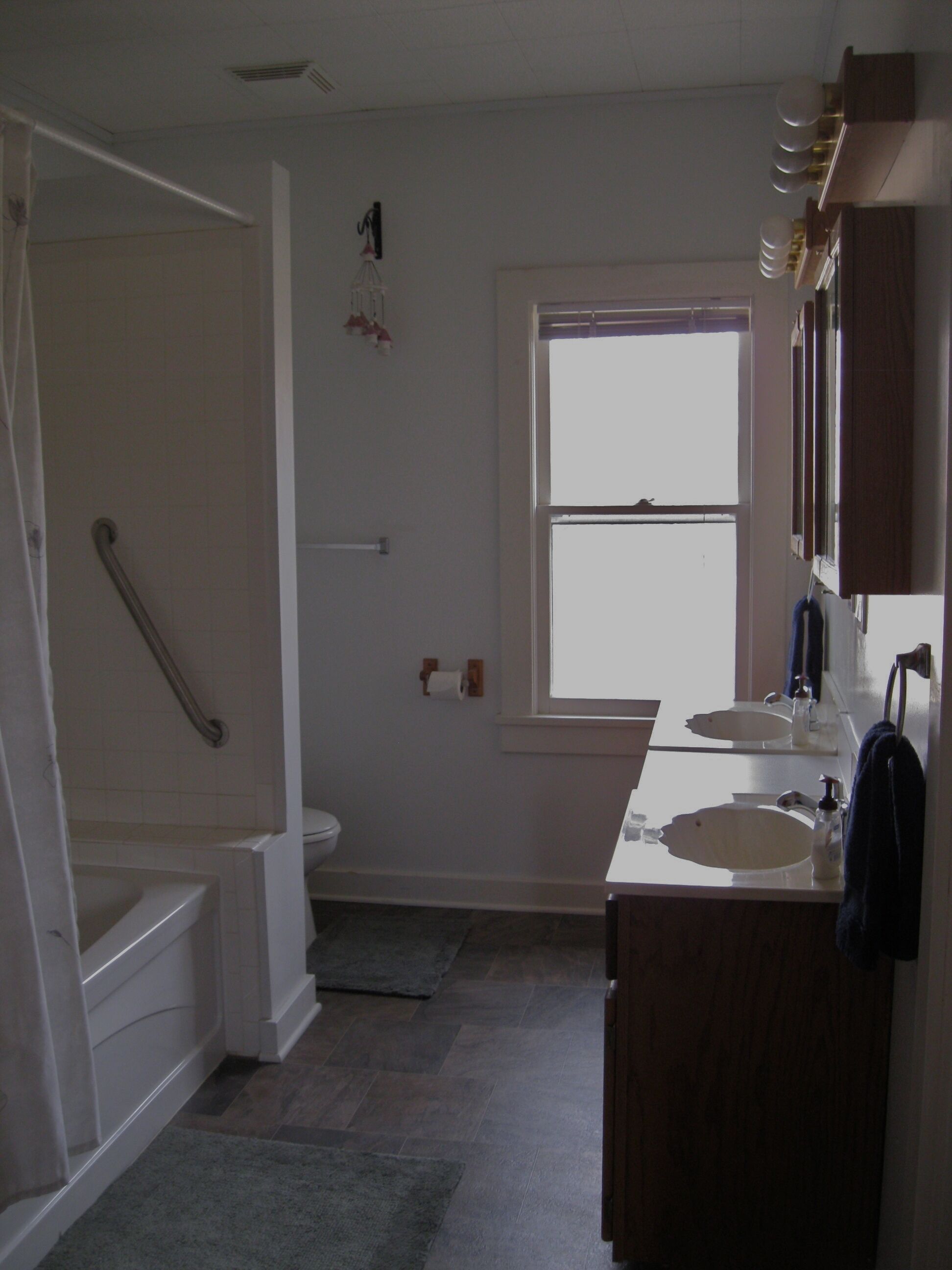 Combined shower/tub, hair dryer, towels, soap