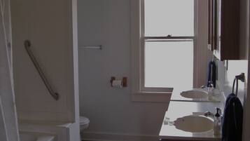 Combined shower/tub, hair dryer, towels, soap
