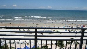 A beach view with a railing in the foreground. - Ocean Walk Resort  505 Ocean Front (Daytona Beach)