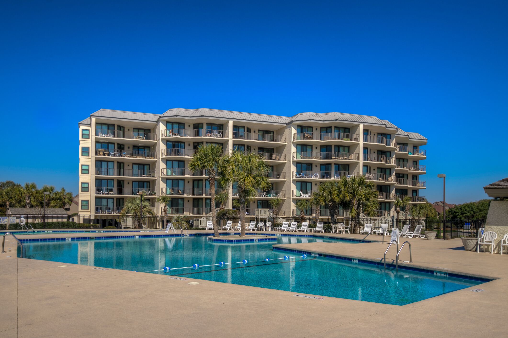 Oceanfront condo at Litchfield By the Sea with access to community pool and tennis courts.