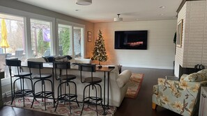 Smart TV, fireplace, DVD player, books