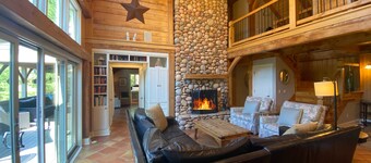 Pine Hollow | An Asheville Luxury Timber-Frame Home w/ Hot Tub, Weddings, and More