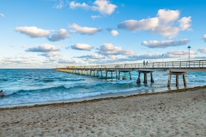 On the beach, sun-loungers, beach towels