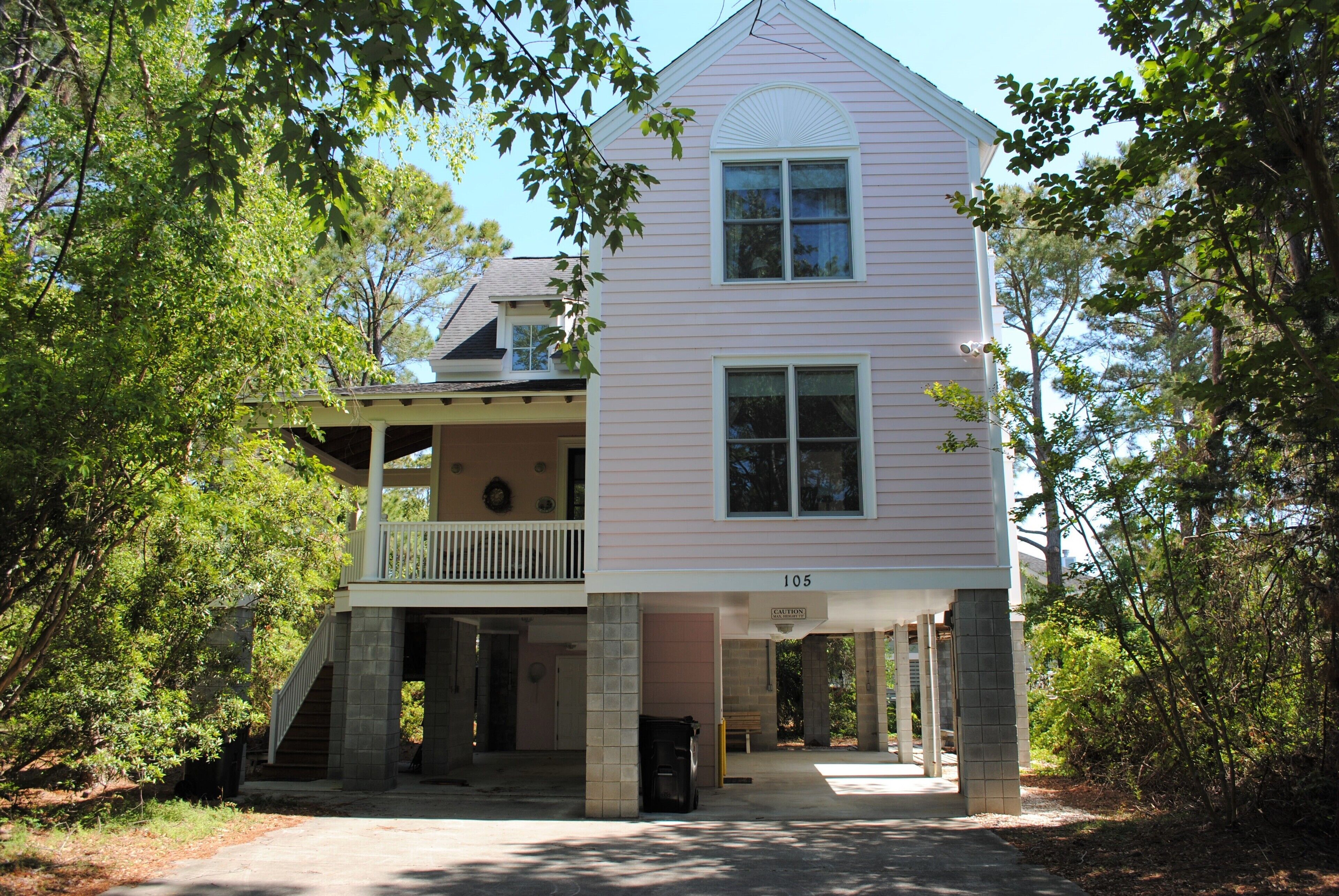 Beach house with 2 covered decks and rooftop deck located at North Litchfield Beach.