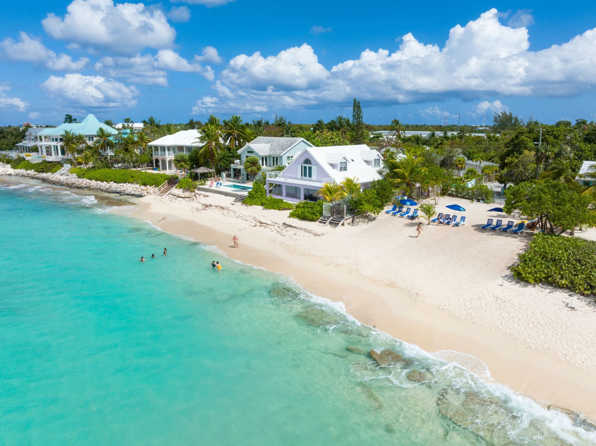 On the beach, sun-loungers, beach umbrellas, beach towels