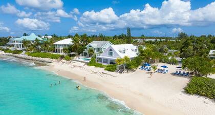 7 Mile Beach Penthouse with Private Beach Club. Ocean views from Roof Terrace.