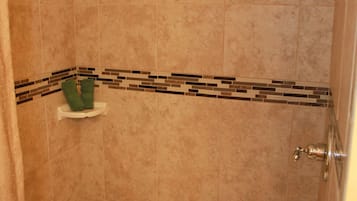 Combined shower/bathtub, towels, soap