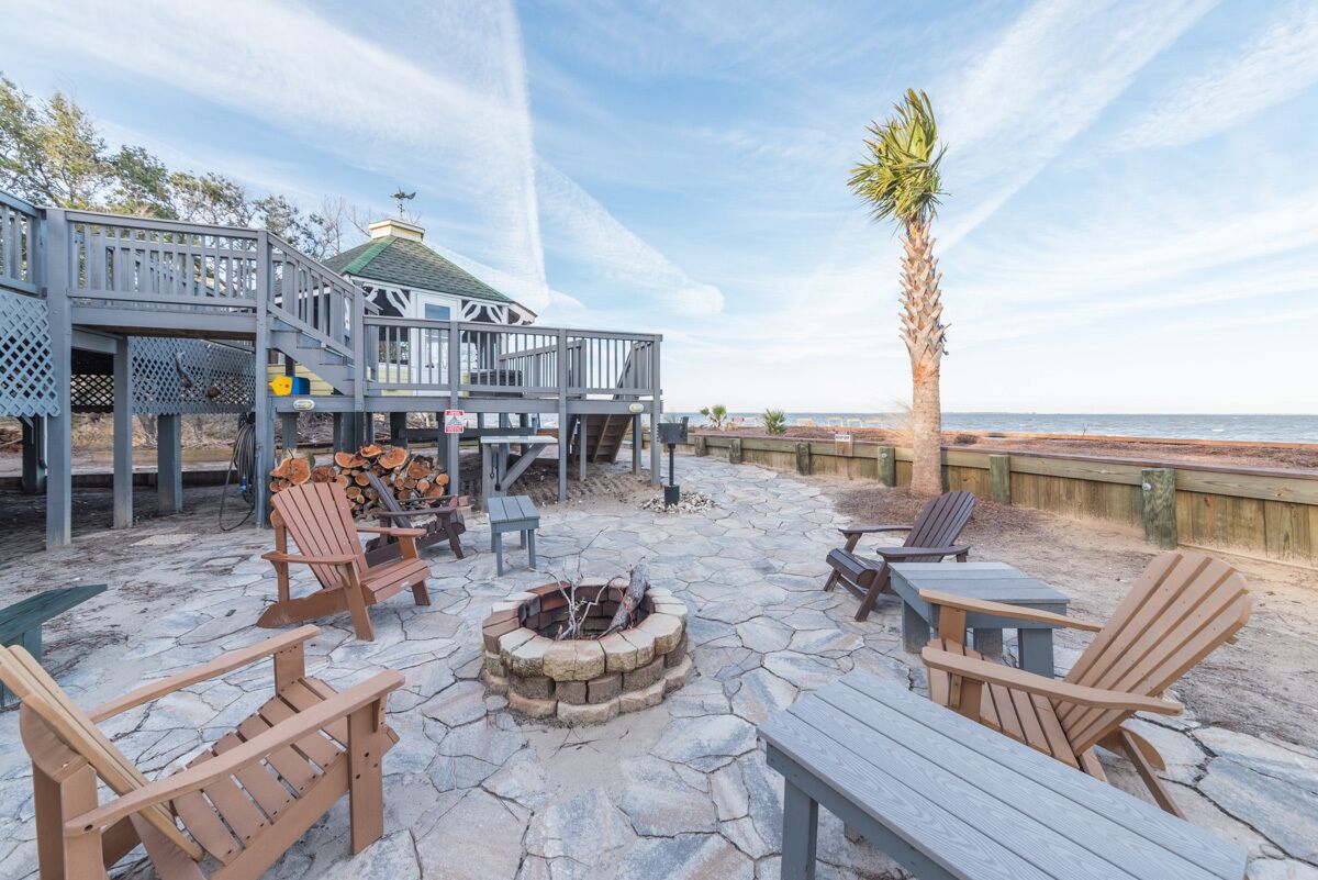 Summer Availability! Waterfront, pet-friendly home with beach access, screened gazebo, and firepit
