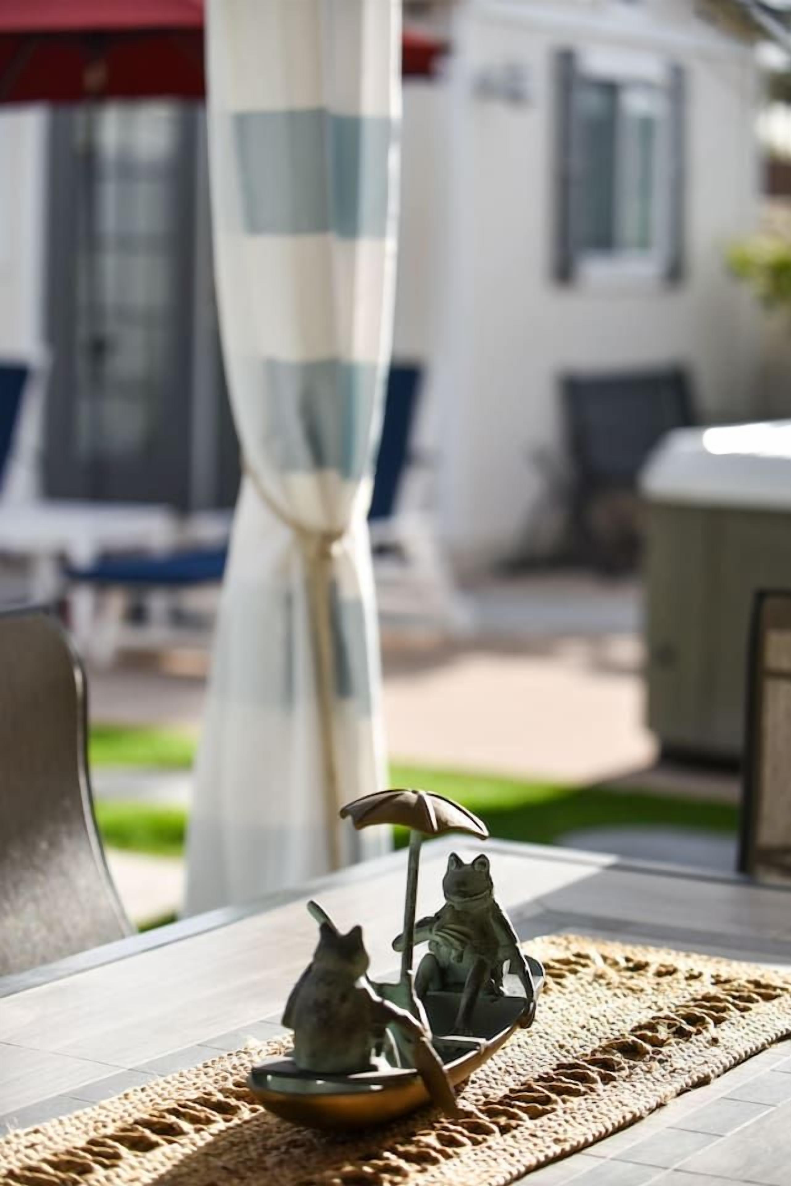 A little greenery adds charm to the covered patio.