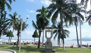 On the beach, sun-loungers