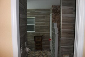 Double marble sinks in the master bathroom with a walk-in closet for extra space