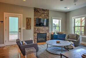 TV, fireplace, books