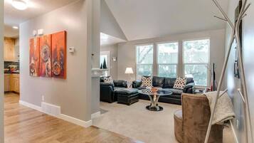 Flat-screen TV, fireplace, video games, foosball