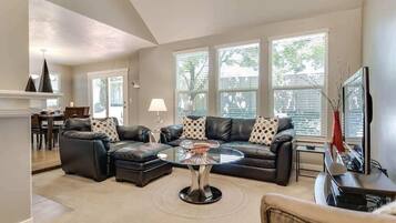 Flat-screen TV, fireplace, video games, foosball