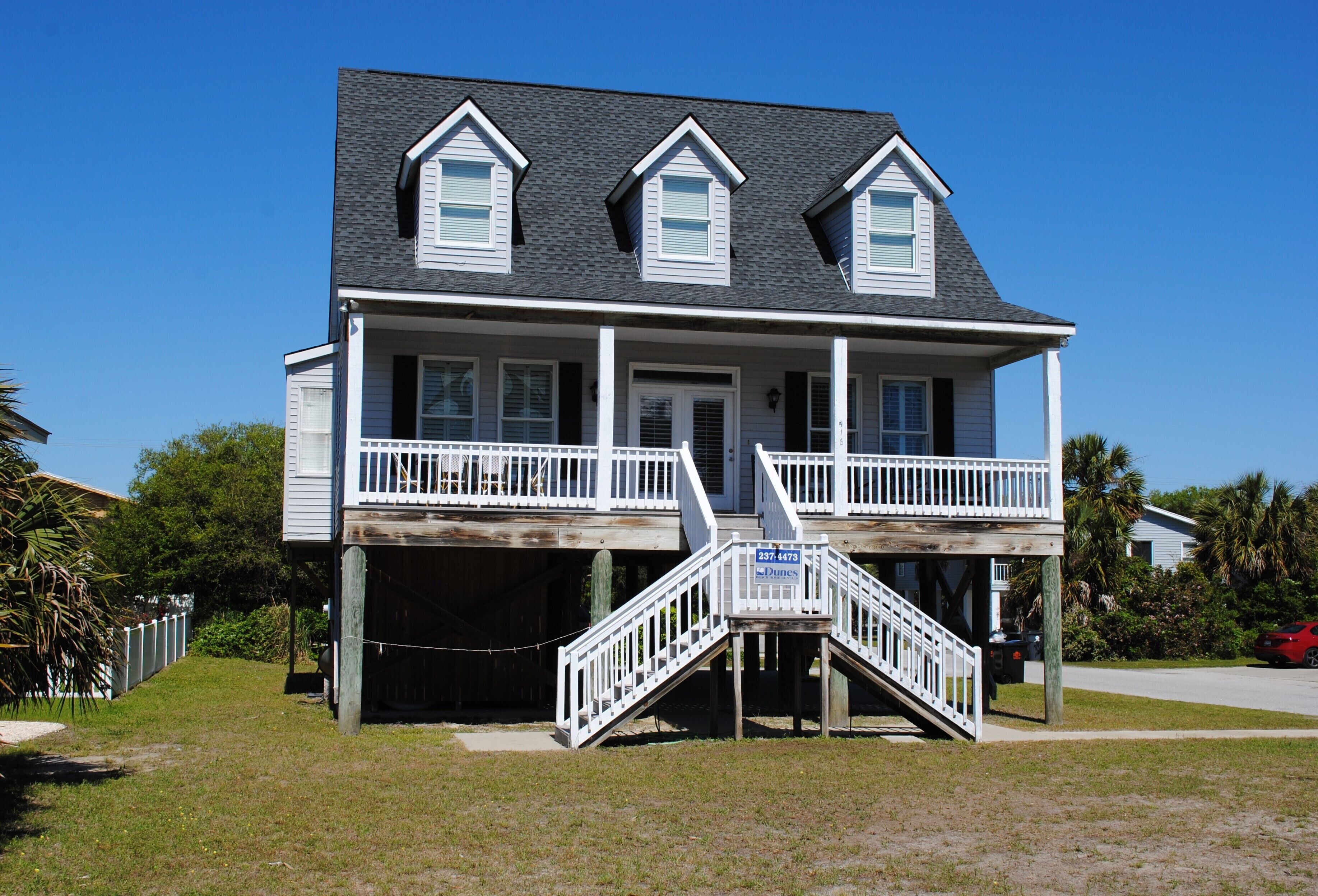 Second row beach home with 2 porches and deck located at South Litchfield in Pawleys Island.