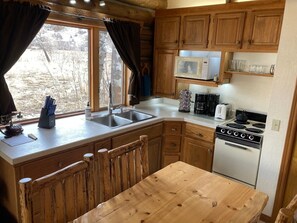 Fridge, microwave, oven, stovetop - Aspen Cabin at Rye Creek Lodge (Darby)