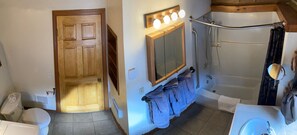 Combined shower/tub, hair dryer, towels, soap
