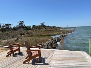 Terrace/patio - Sea Biscuit:  Pet friendly, rustic soundfront cottage, great sunsets. (Ocracoke)
