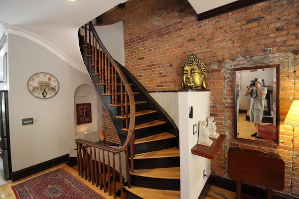 Cool Historic Details in this 1860's townhome apartment, stairs required!