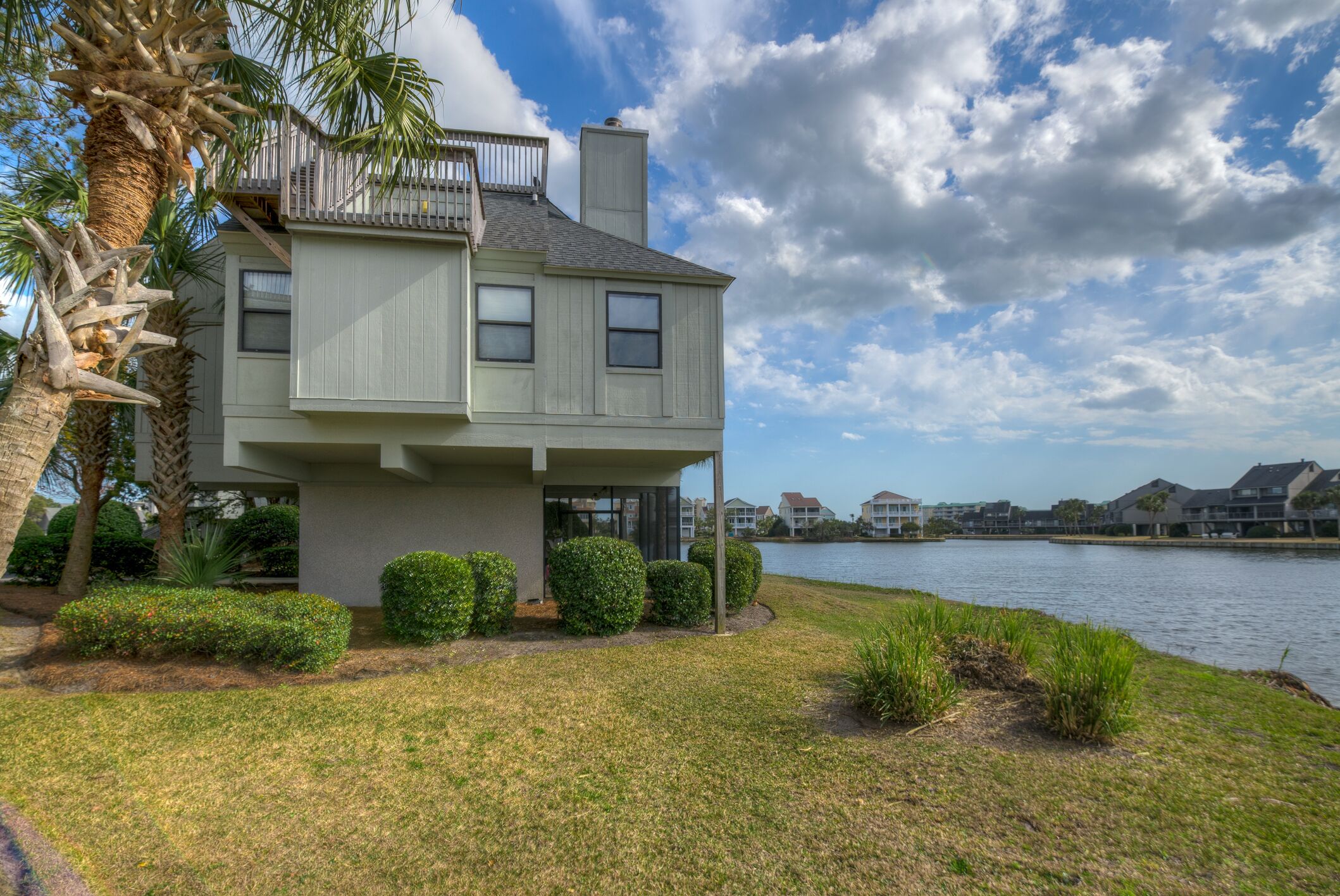 Villa overlooking lake with community pool access located within Litchfield By the Sea.
