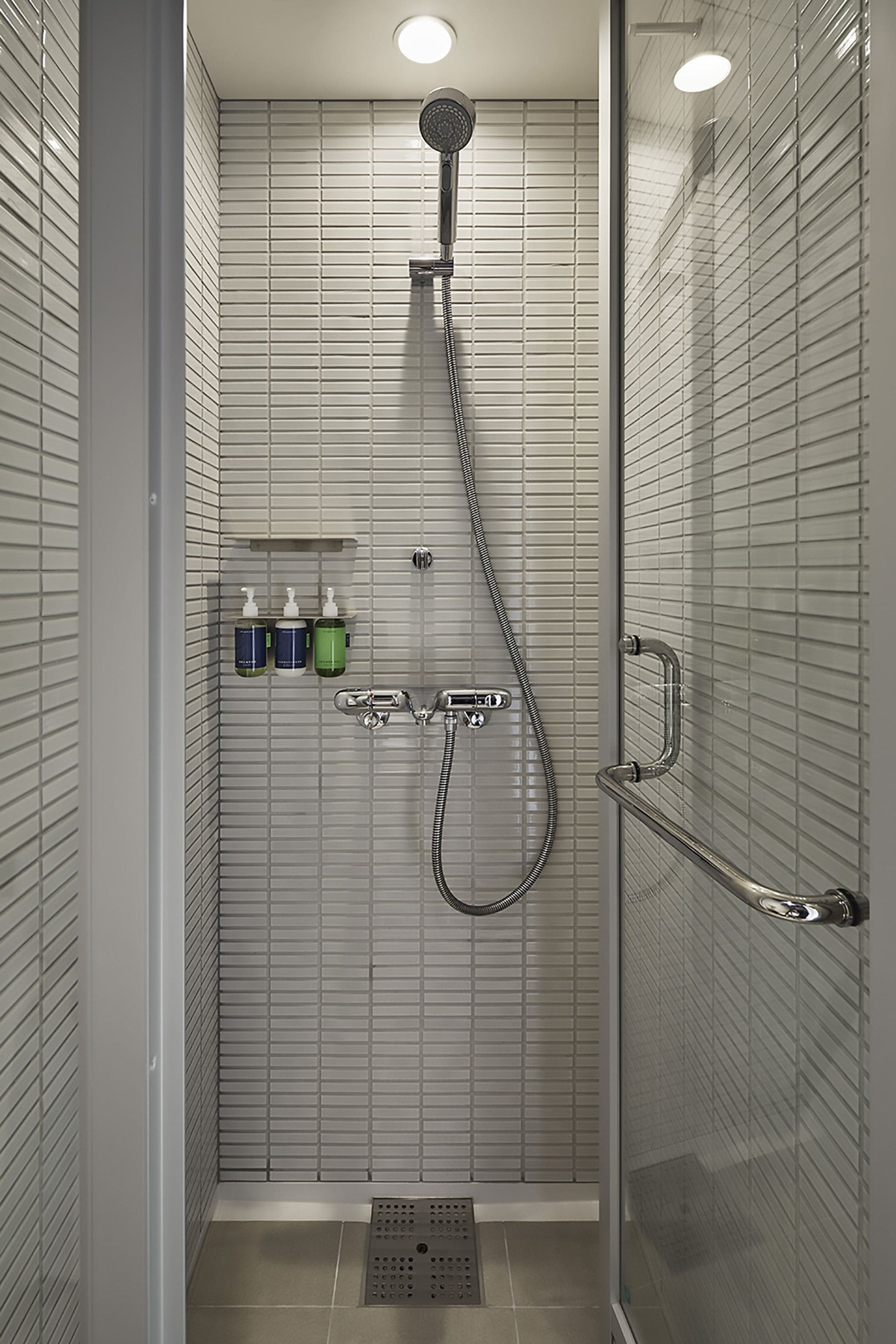 hair dryer, slippers, electronic bidet, towels