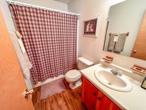 Bathtub, hair dryer, towels