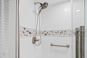Combined shower/tub, hair dryer, towels, soap