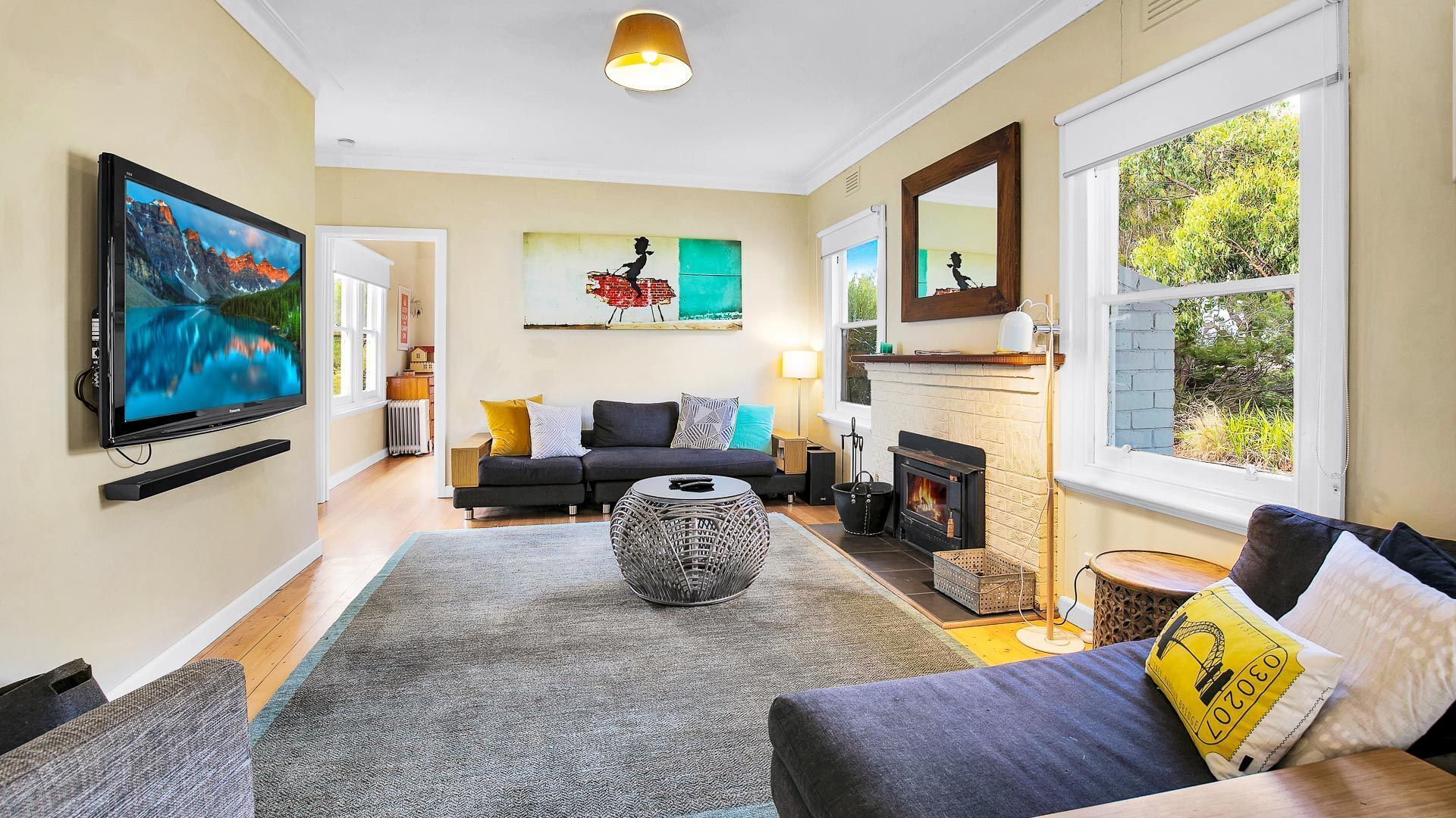 TV, fireplace, books, video library