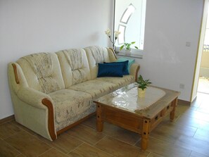 Family Apartment (I) | Living room | TV - VierJahreszeiten Appartments (Lübben (Spreewald))