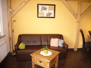 Family Apartment (IV) | Living area | TV - VierJahreszeiten Appartments (Lübben (Spreewald))