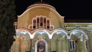 A large building with a prominent dome and arched windows. -   Sea  and Sun rise views. Villa with private pool and gated children Play Area. (paralimni)
