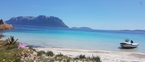 On the beach, sun loungers