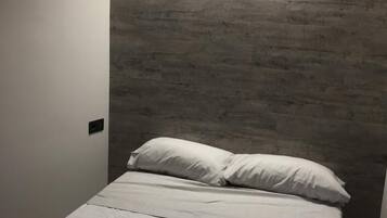 2 dormitorios, escritorio, tabla de planchar con plancha y wifi gratis