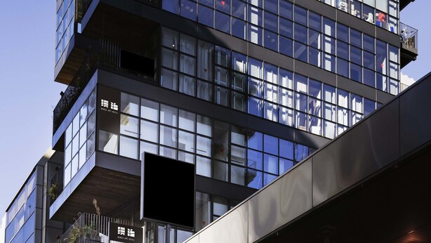 A modern building with multiple balconies and large windows, named "Landpool Kanda Terrace". - MANGA ART HOTEL, TOKYO - Hostel (Tokyo)