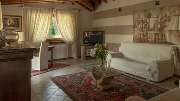 Smart TV, fireplace, foosball, books