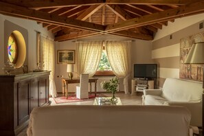 Smart TV, fireplace, table football, books